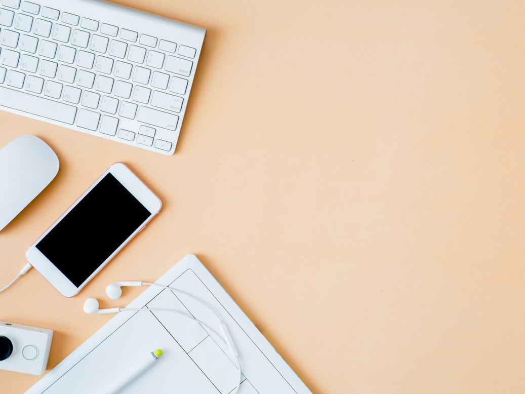 top view of office desk workspace with notebook, graphic tablet, smartphone and gadget on table background, graphic designer, Creative Designer concept.